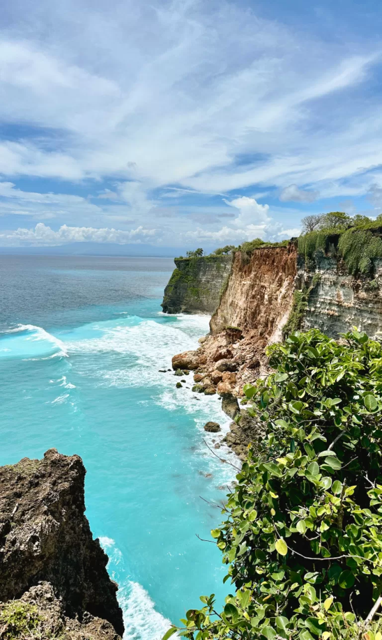 Cliffs in Uluwatu drive with scooter